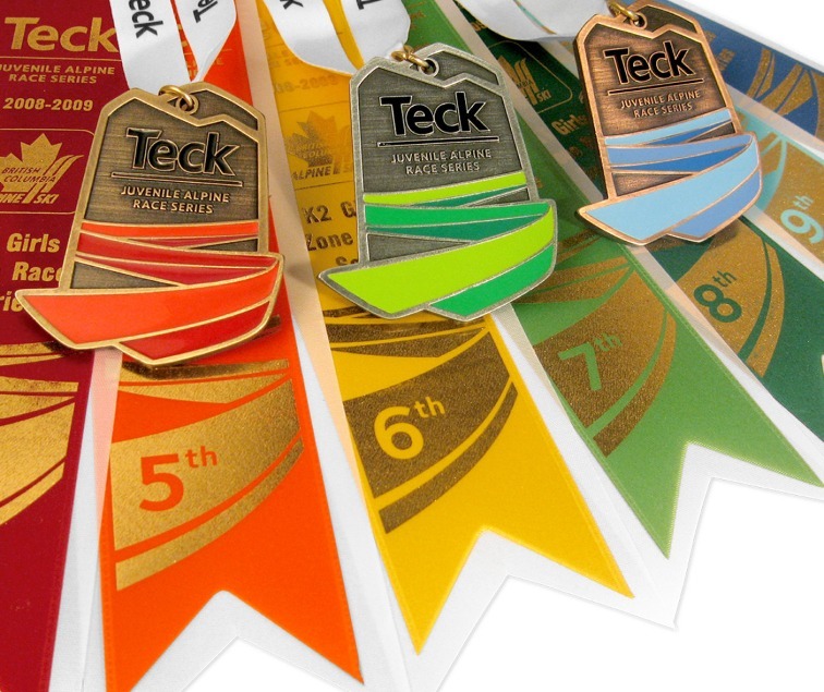 Teck BC Alpine medals and ribbons for race placement in various brand colours